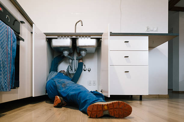 Professional Plumbing technician working in East Lansing, MI